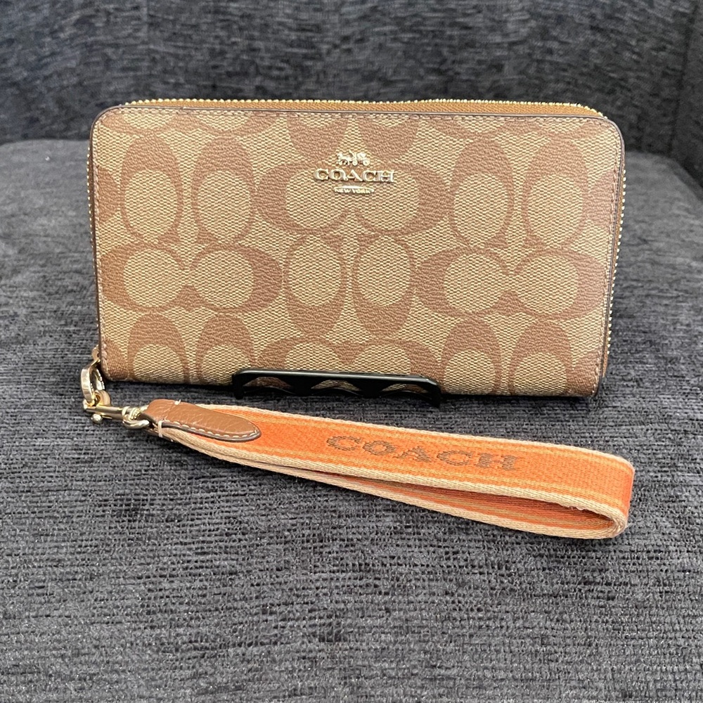NWOT...Coach Tan and Brown Signature Wristlet